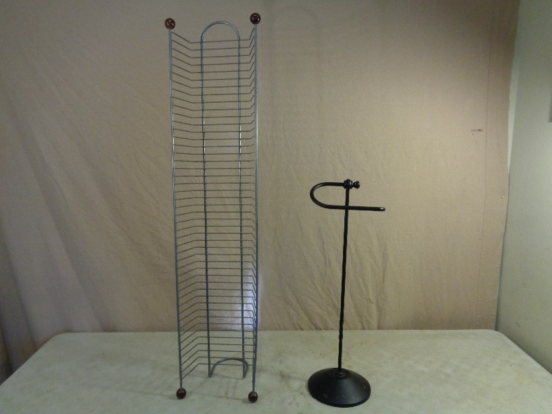 lot 133 image: Metal DVD Tower and Metal Toilet Paper Holder
