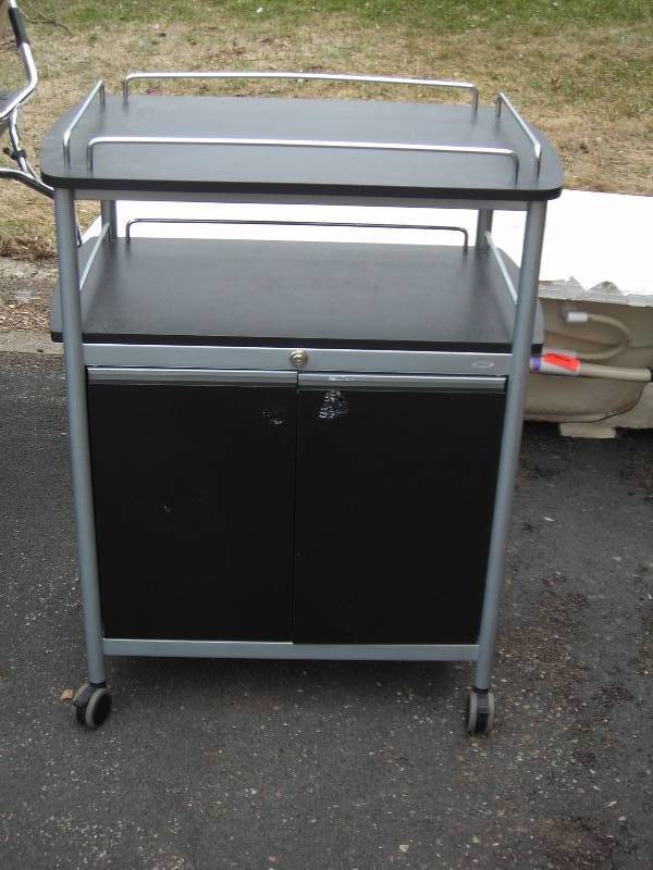 lot 17 image: AVMedia Cabinet With Top Shelf (On Wheels)