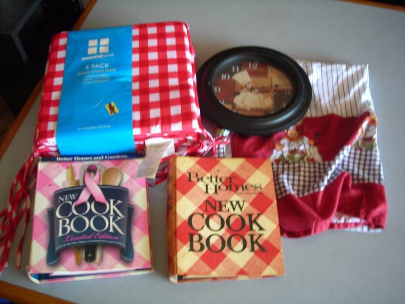 lot 78 image: NEW Set Of 4-Chair Pads, Kitchen Clock, Pair Curtains, Betty Crocker Cook Books