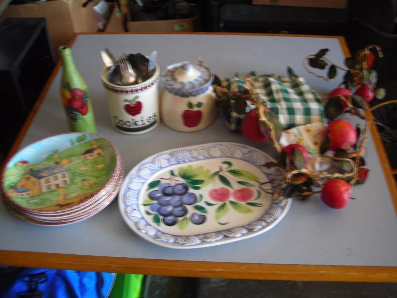 lot 84 image: Kitchen Apple Theme Decor, Flatware, Curtains, Dishes, More