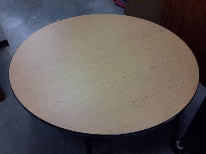 5, 60 in Round simulated wood top tables.. Adjustable height.  NEW
