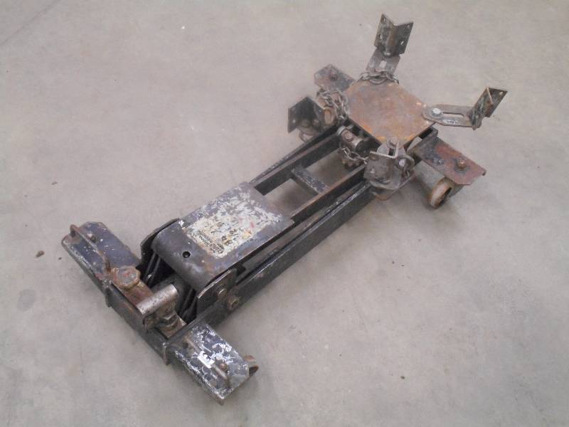 lot 12 image: Napa 12-Ton Rolling Transmission J...