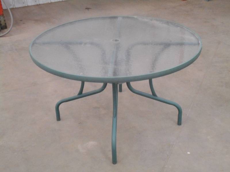 lot 14 image: 48 Round Top Patio Table With Glas...