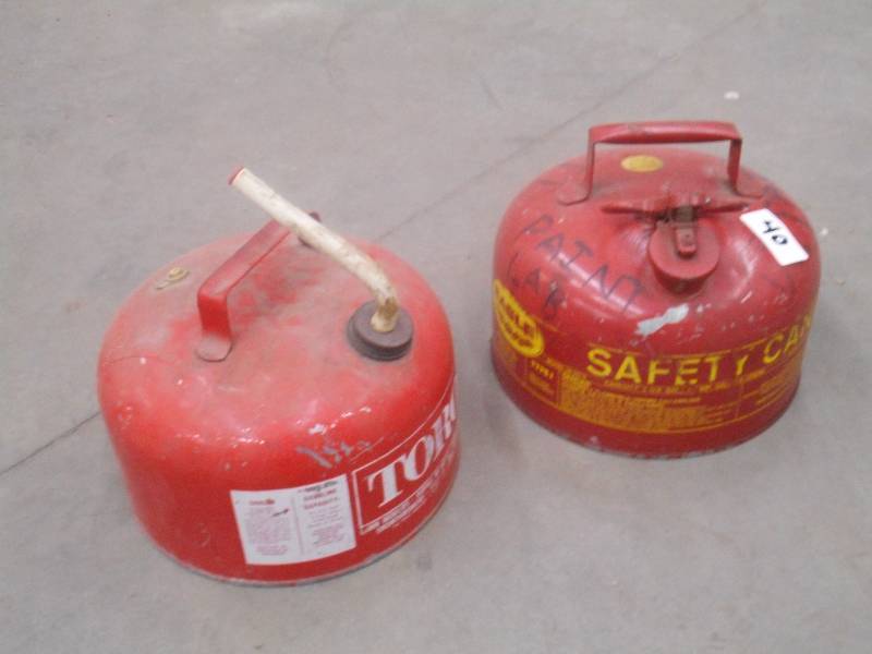 lot 40 image: (2) 2.5-Gallon Steel Gas Cans ...