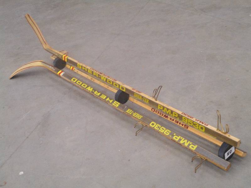 lot 50 image: Unique Sherwood Hockey Stick & Puck...
