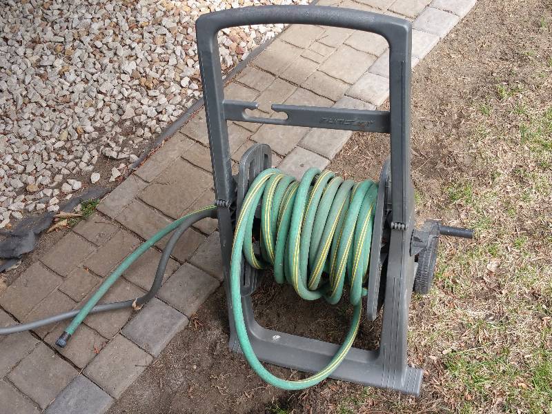 lot 23 image: Hose Wheel and Hose