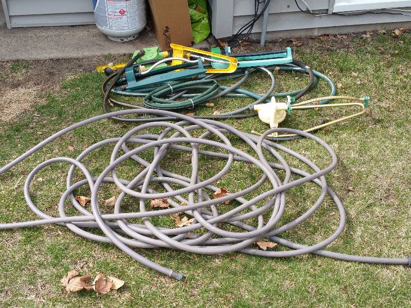 lot 24 image: Group of Hoses and Sprinklers