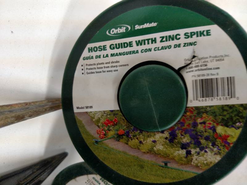 lot 157 image: Water Hose & (12) Hose Guides...