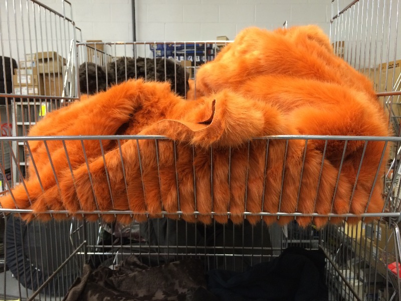 lot 78 image: Assorted throw blankets, drops, props - get the entire rack