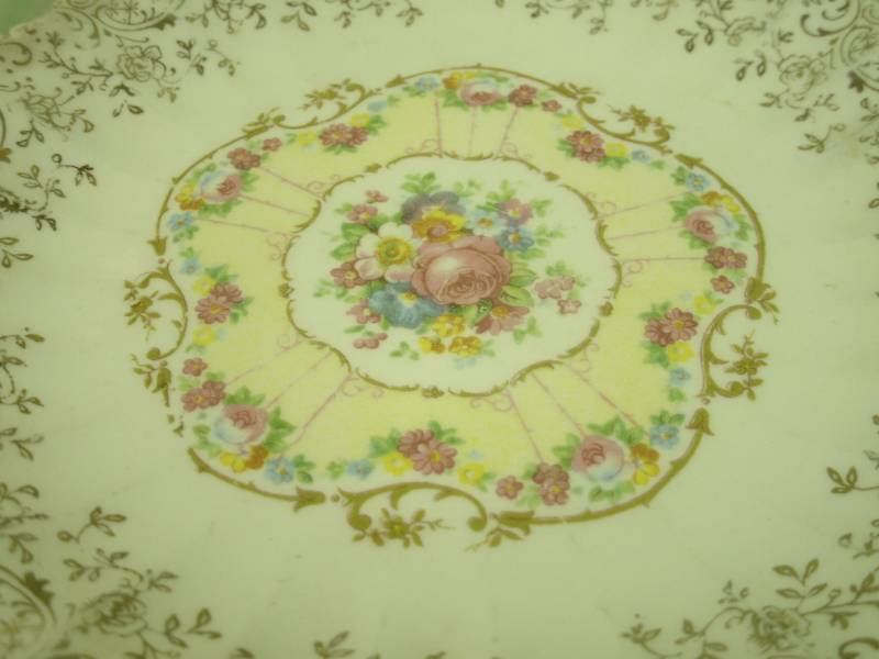 7 salad plates by American Limoges