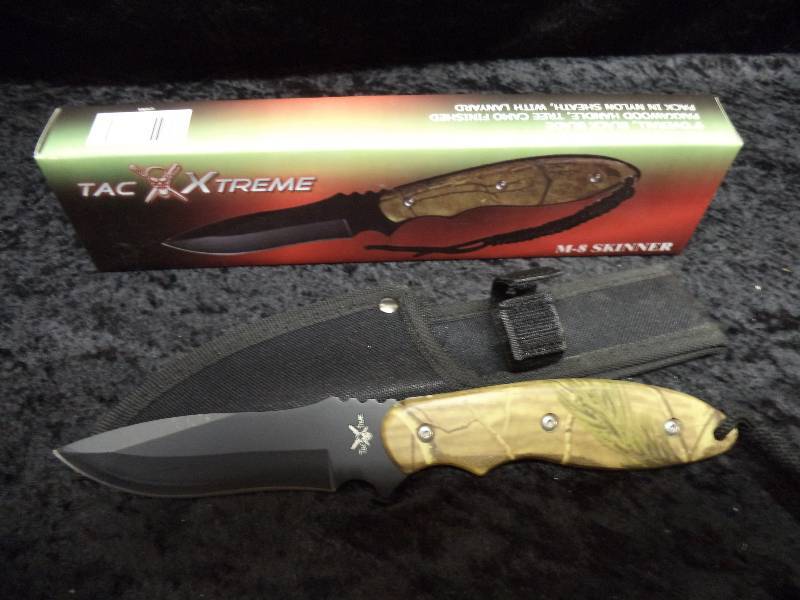 lot 99 image: Collectible Knife - Tree Camo Finish