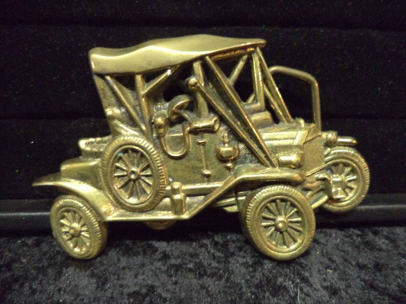 lot 93 image: Belt Buckle - Vintage Car