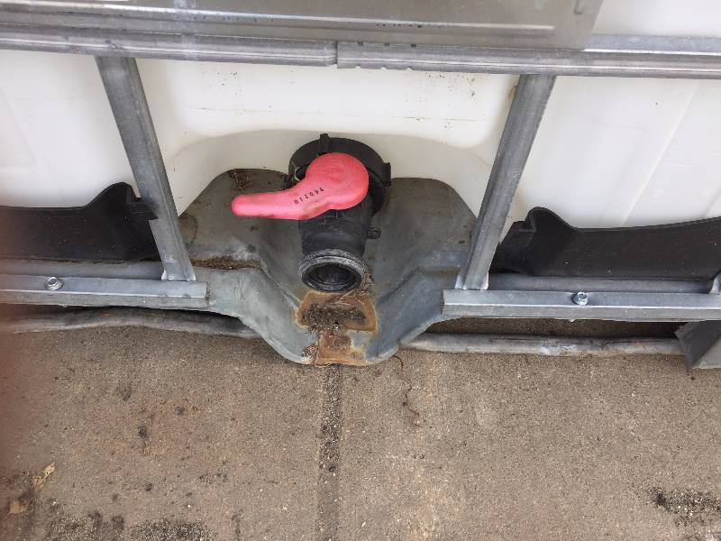 lot 39 image: FLUID TOTE 250 GALLON WITH SHUT OFF VALVE