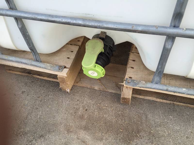 lot 40 image: FLUID TOTE 250 GALLON WITH SHUT OFF VALVE