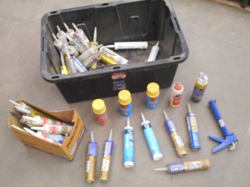Tote Of Assorted Caulk, Adhesive, S...