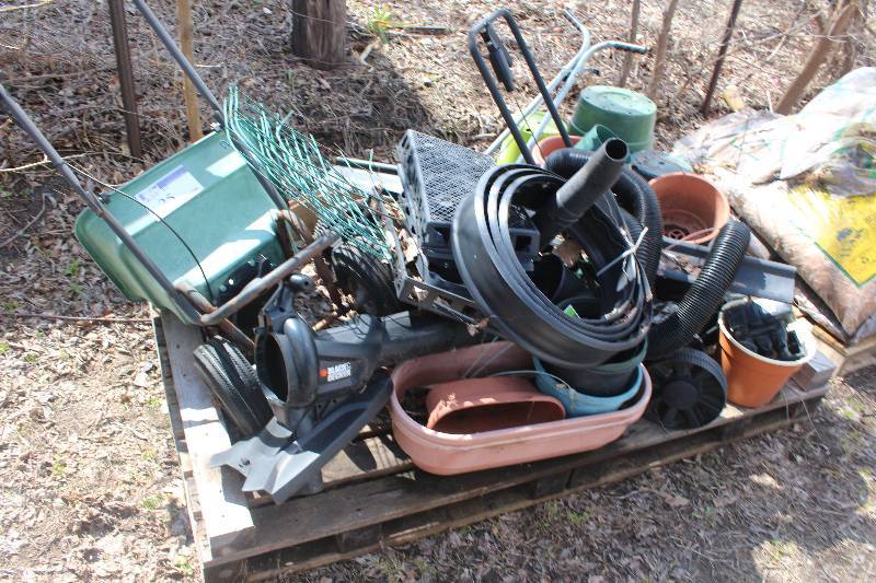 Pallet Lot of Gardening Supplies Including Spreaders, Pots, Edging, And More