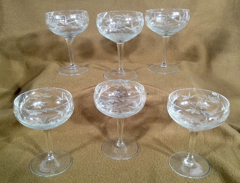 lot 9 image: Elegant Set Of Etched Wine & Champagne Glasses