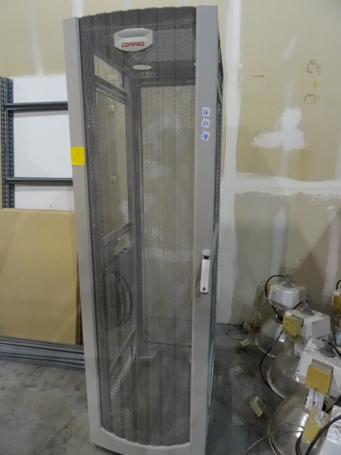 lot 27 image: Compaq server cabinet on wheels.