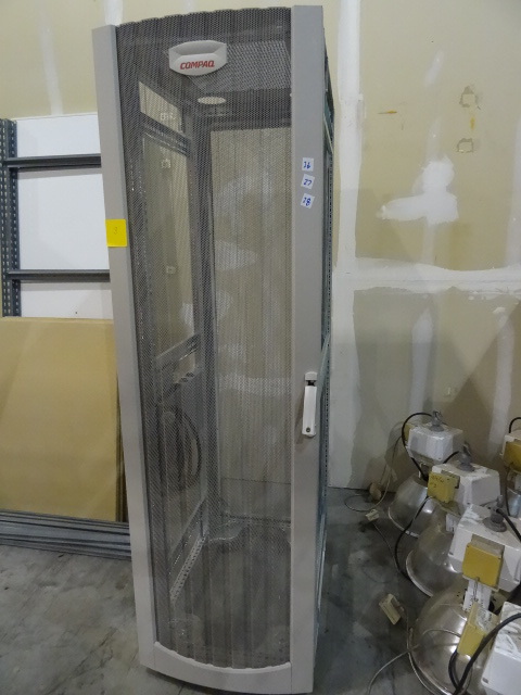 lot 28 image: Compaq server cabinet on wheels.