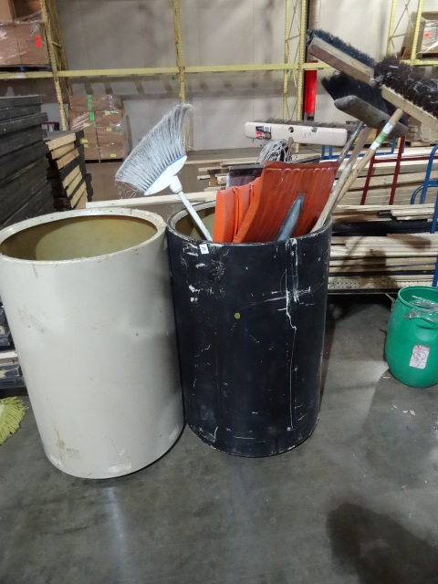 lot 236 image: 2 Barrels with Brooms and Shovels