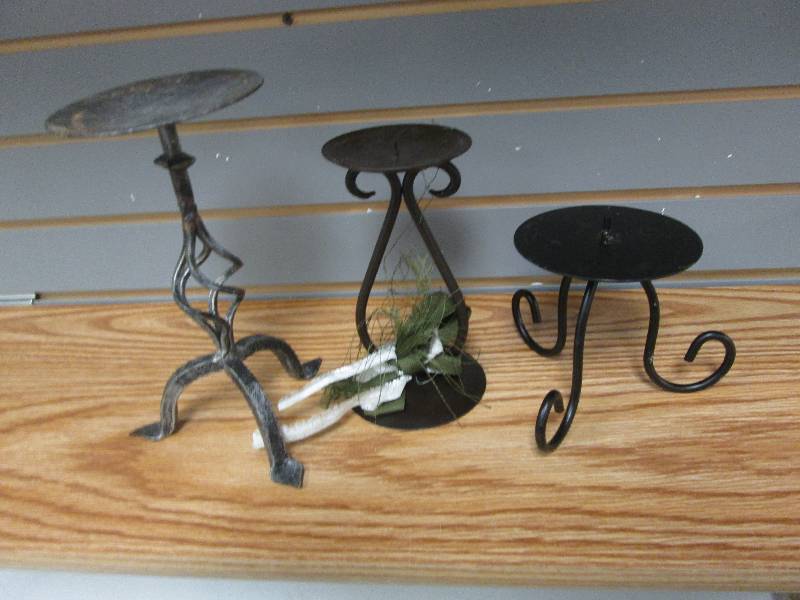 Lot of 3 metal pillar candle holder...