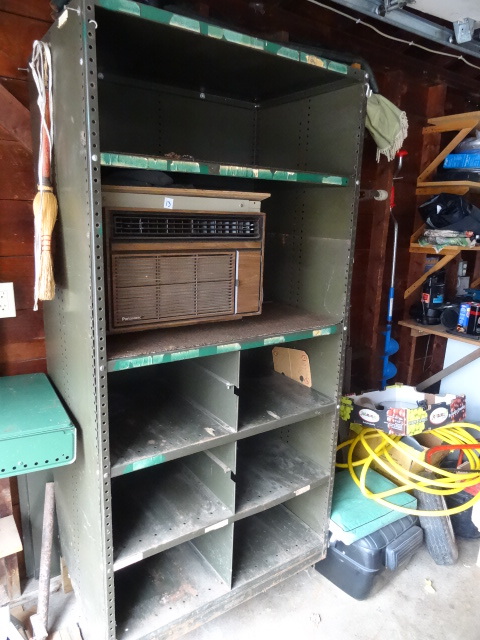 lot 14 image: Metal Shelving Unit Bolted to Wall