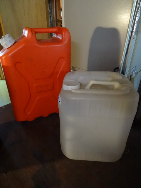 lot 203 image: Gallon 3-5 Plastic Jug