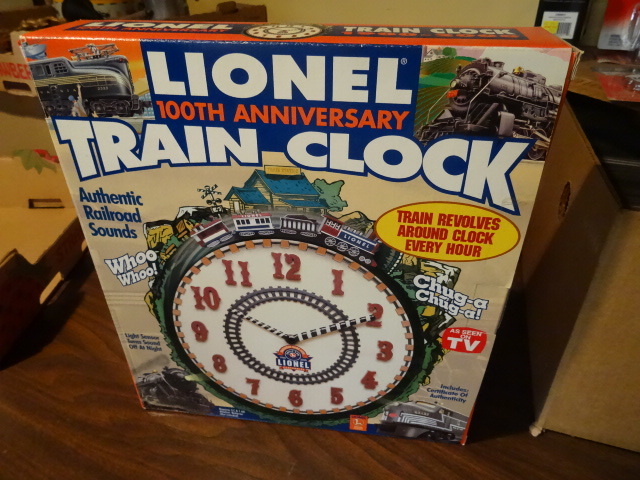 lot 312 image: Lionel 100th Anniv. Train Clock
