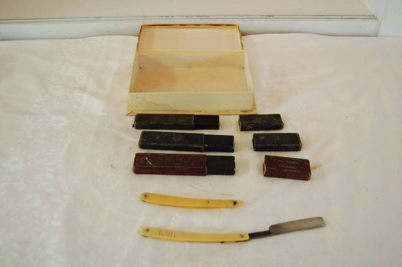 lot 11 image: Vintage Straight Razor and Holders