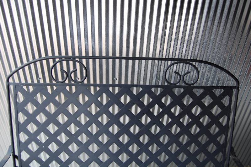 lot 280 image: Wrought Iron Rocking Patio Bench