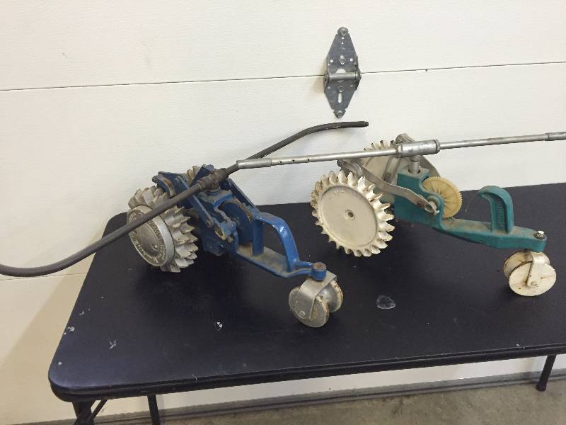 lot 195 image: Vintage Cast Iron Self Moving Tractor Watering Sprinkler