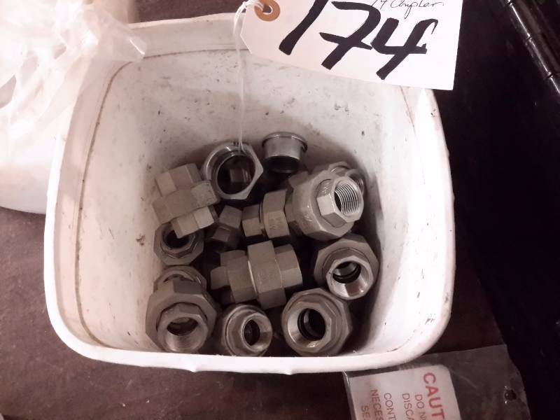 lot 174 image: Pail of Stainless steel  1 12 in Couplings