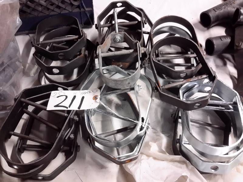 lot 211 image: 25, 4in pipe hangers.