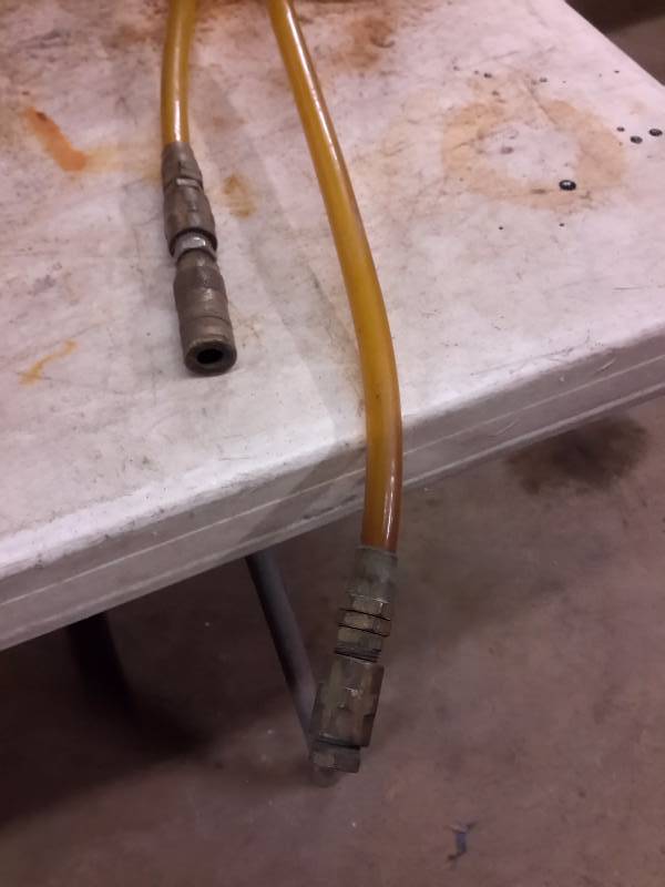 lot 97 image: Booster Pac and Retractable Air Hose