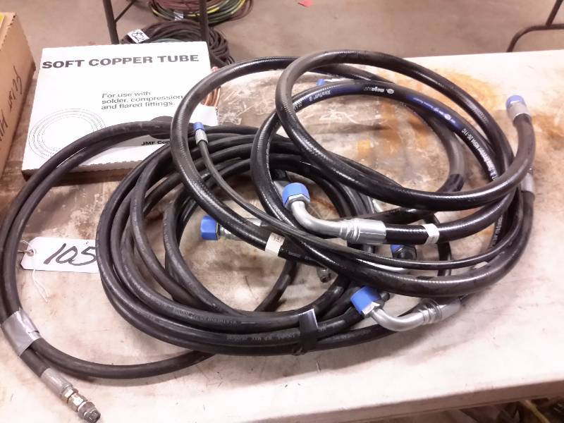lot 105 image: Lot of High Pressure Hoses.. See closeups. Roll of Soft Copper Tubing