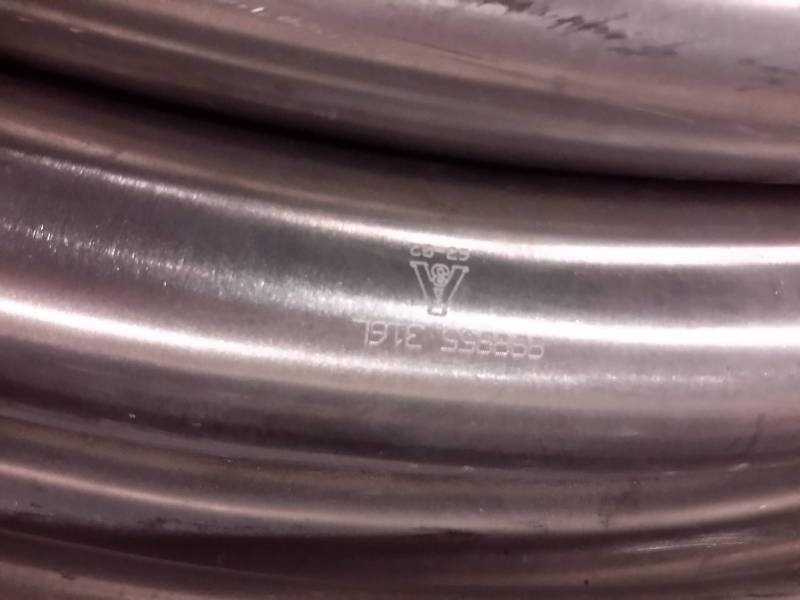 lot 141 image: 8 pieces of 2 12 in Stainless elbow pipe.. Approx 36in long.. See closeup picture for identification code