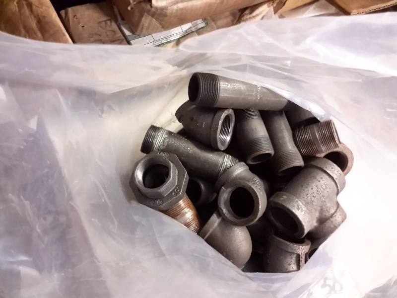 lot 238 image: Box of  1 14 in Couplers and Elbows.  45deg, ts. Nipples