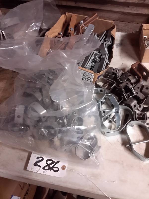 lot 286 image: large lot of Pipe hangers as pictured.  34in, 1 14 in, 2in.  See pictures for details.