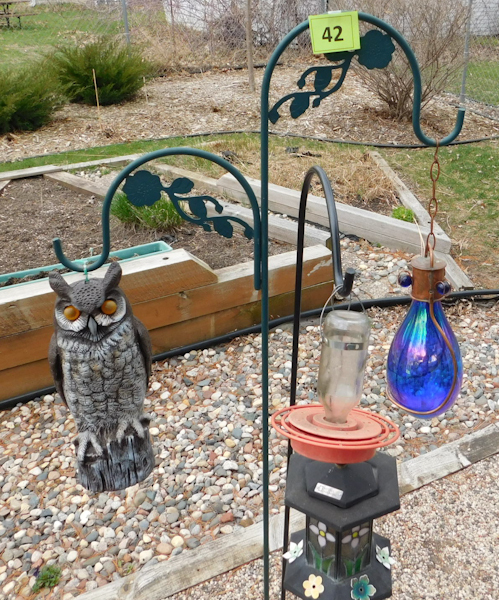 lot 42 image: Garden shepard hooks with hanging ornaments one is an owl