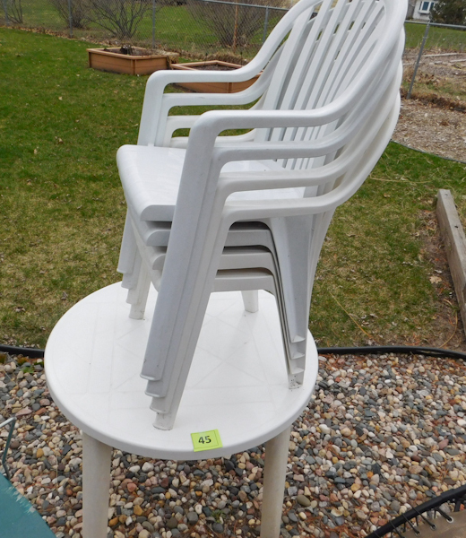 lot 45 image: plastic white table and 4 matching chairs