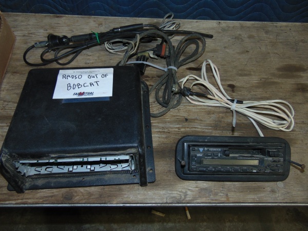 lot 84 image: Radio and Speakers From Bobcat Skid loader