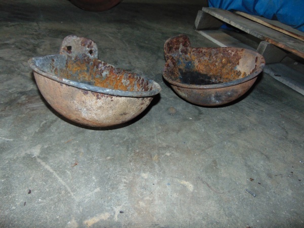 Old cast iron cups out of a barn