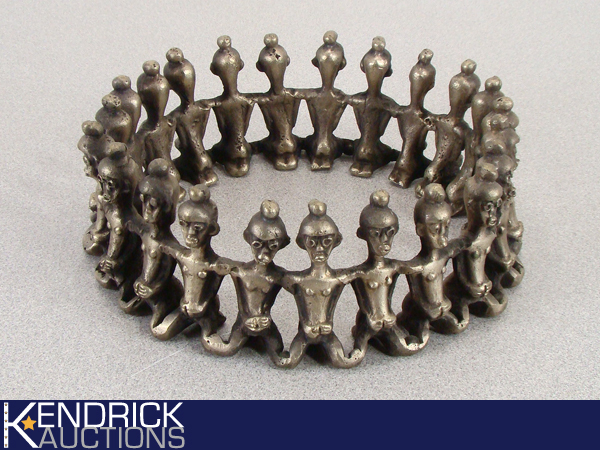 lot 9 image: Silver Metal African Ancestors Circle