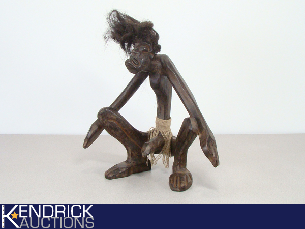 lot 30 image: Exotic Wood Carved African Male Fertility Statue