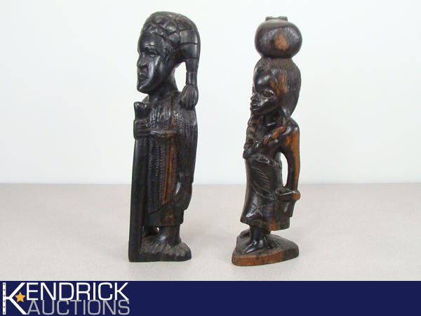 lot 55 image: 2 Ethnic Themed Exotic Wood Carved Man and Woman Figures