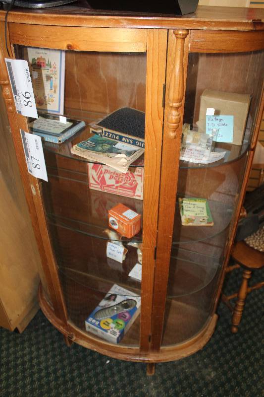 Contents of Cabinet Including Books, Electronics