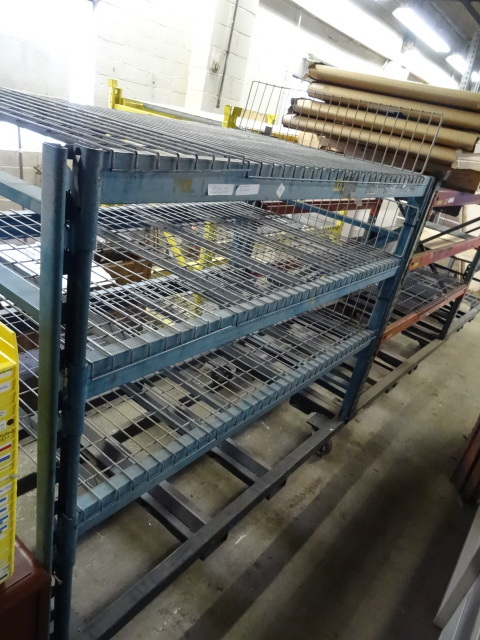 lot 64 image: Shelving Unit On Wheels