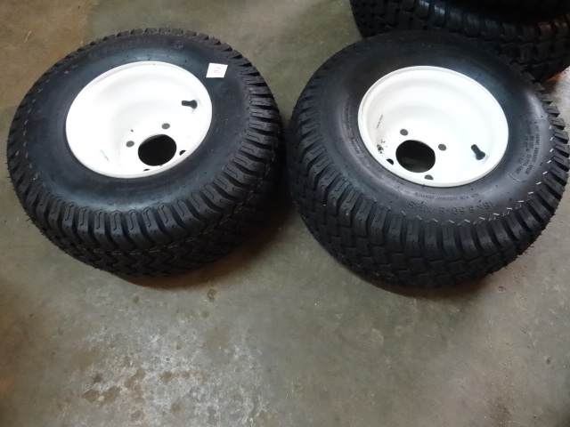 lot 90 image: 2 Tires And Rims 4 Hole Rim