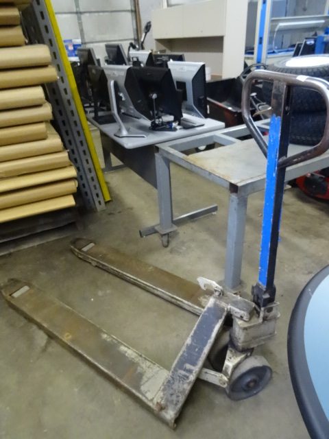 lot 246 image: Full Size Pallet Jack Works
