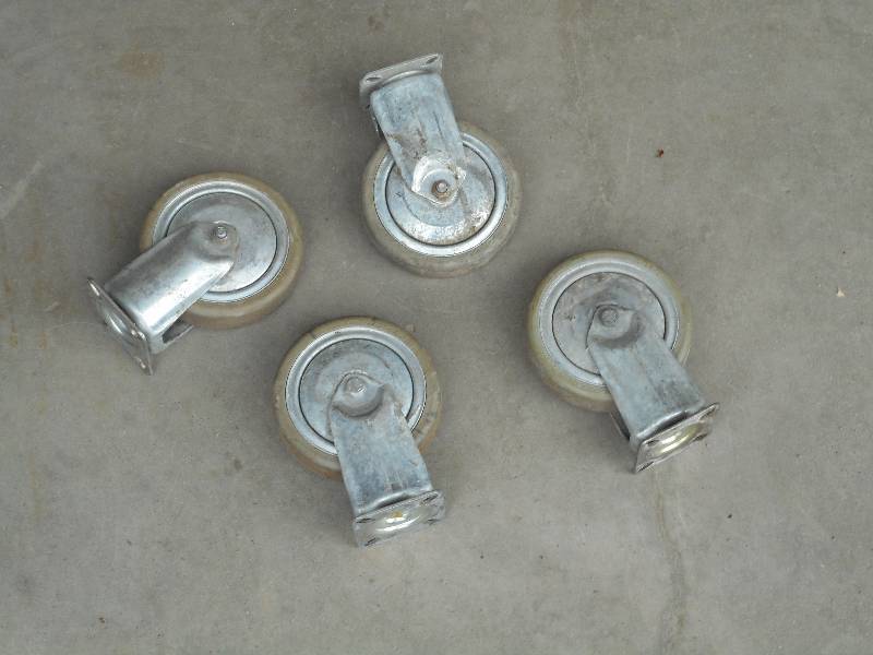 lot 21 image: (4) Medium Grey Commercial Caster Wheels